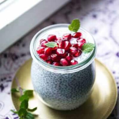 Chia seeds recipe for dessert with pomegranate seeds and mint